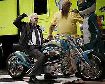 Warren Buffett on motorcycle